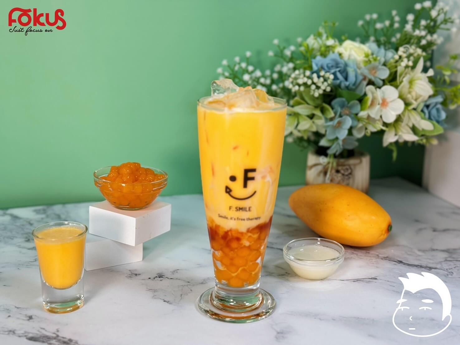 Lulu Mango bubble tea with mango pomelo powder, coconut milk, and mango tapioca